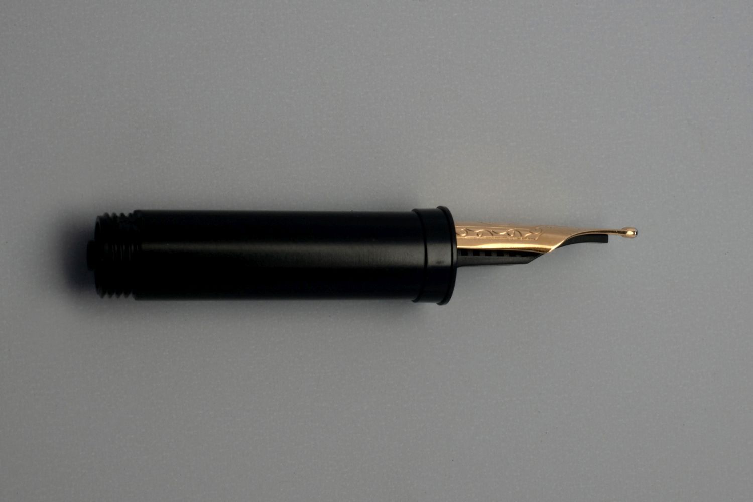 Nib, type 060, Triple, gold 18K, side face