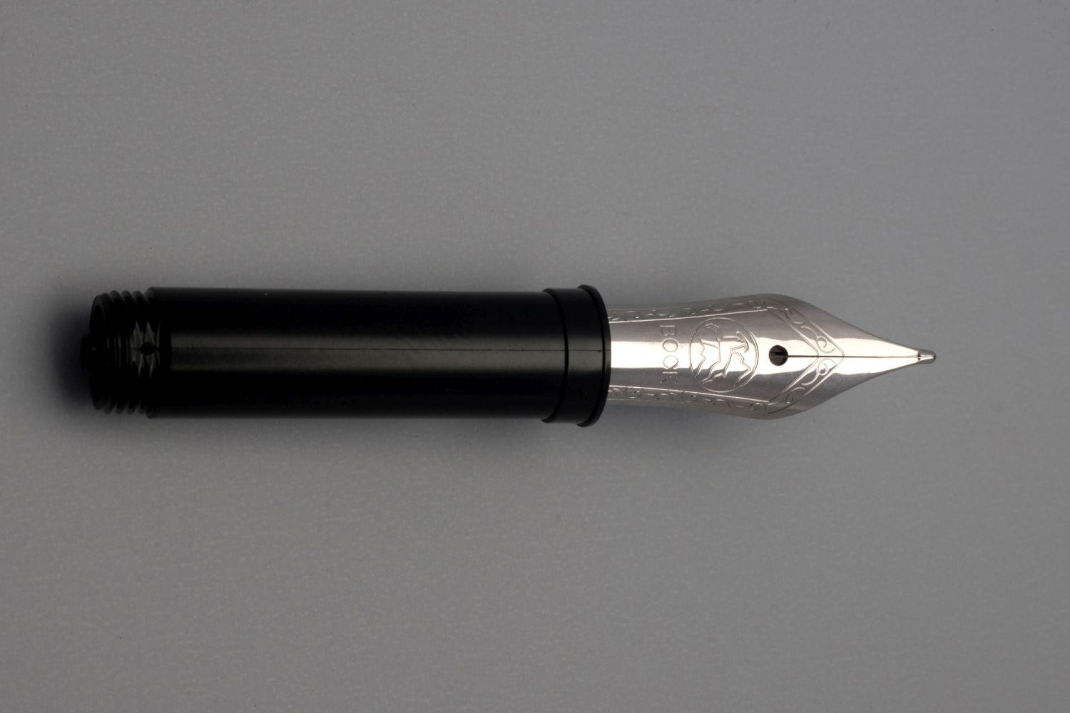 Medium-sized, small nib, including an ink-feed system