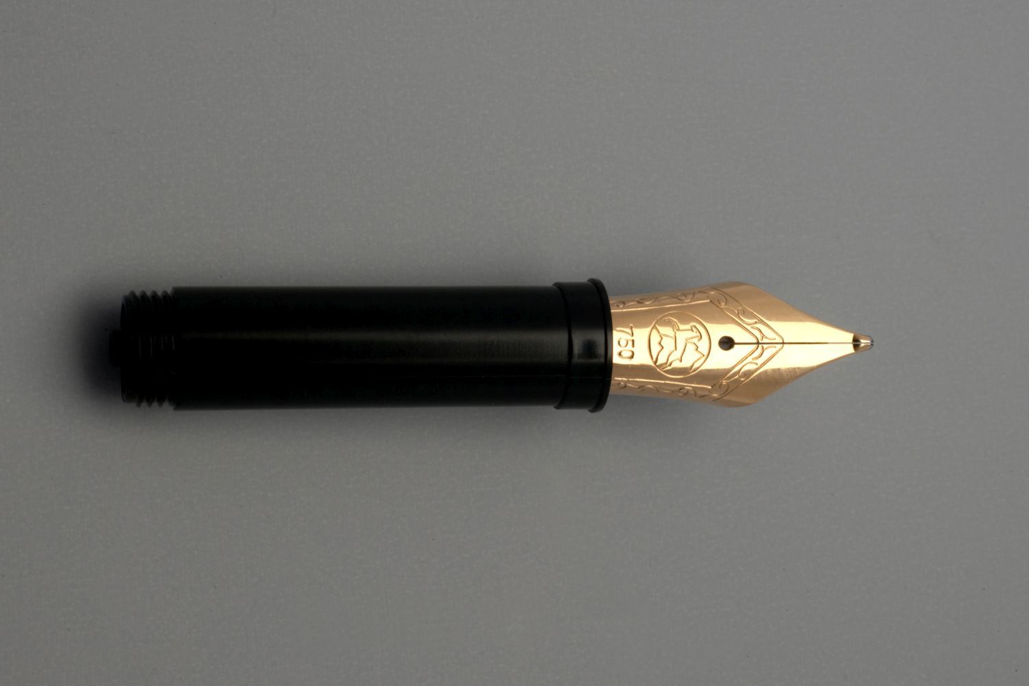 Small nib, including an ink-feed system